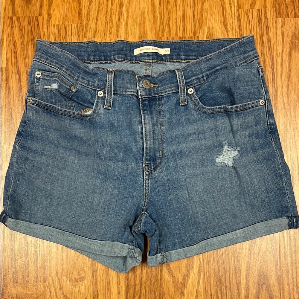 Levi's Blue Jean Shorts with Rolled Hem and Distressed Details